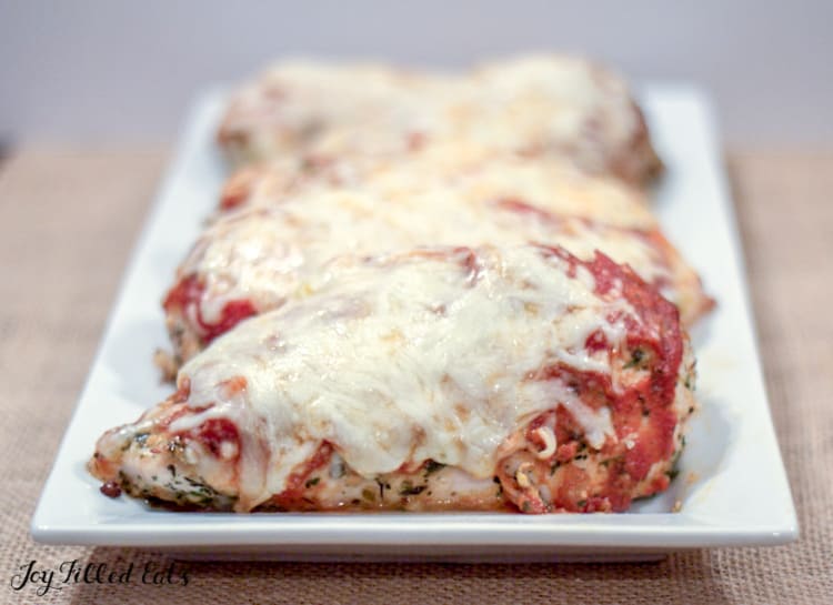 keto chicken parmesan on a white serving platter